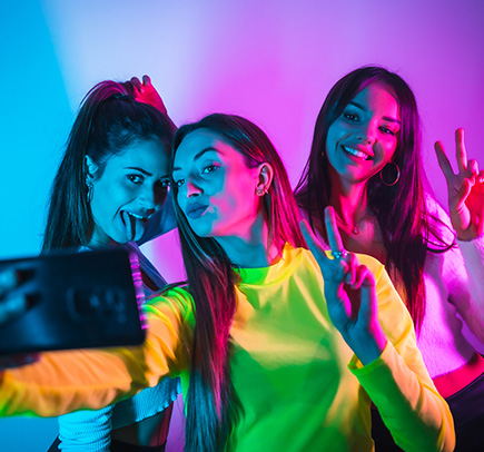 Group of Women Taking Selfies Inside The Amazing 360 Multimedia Photo and Video Booth